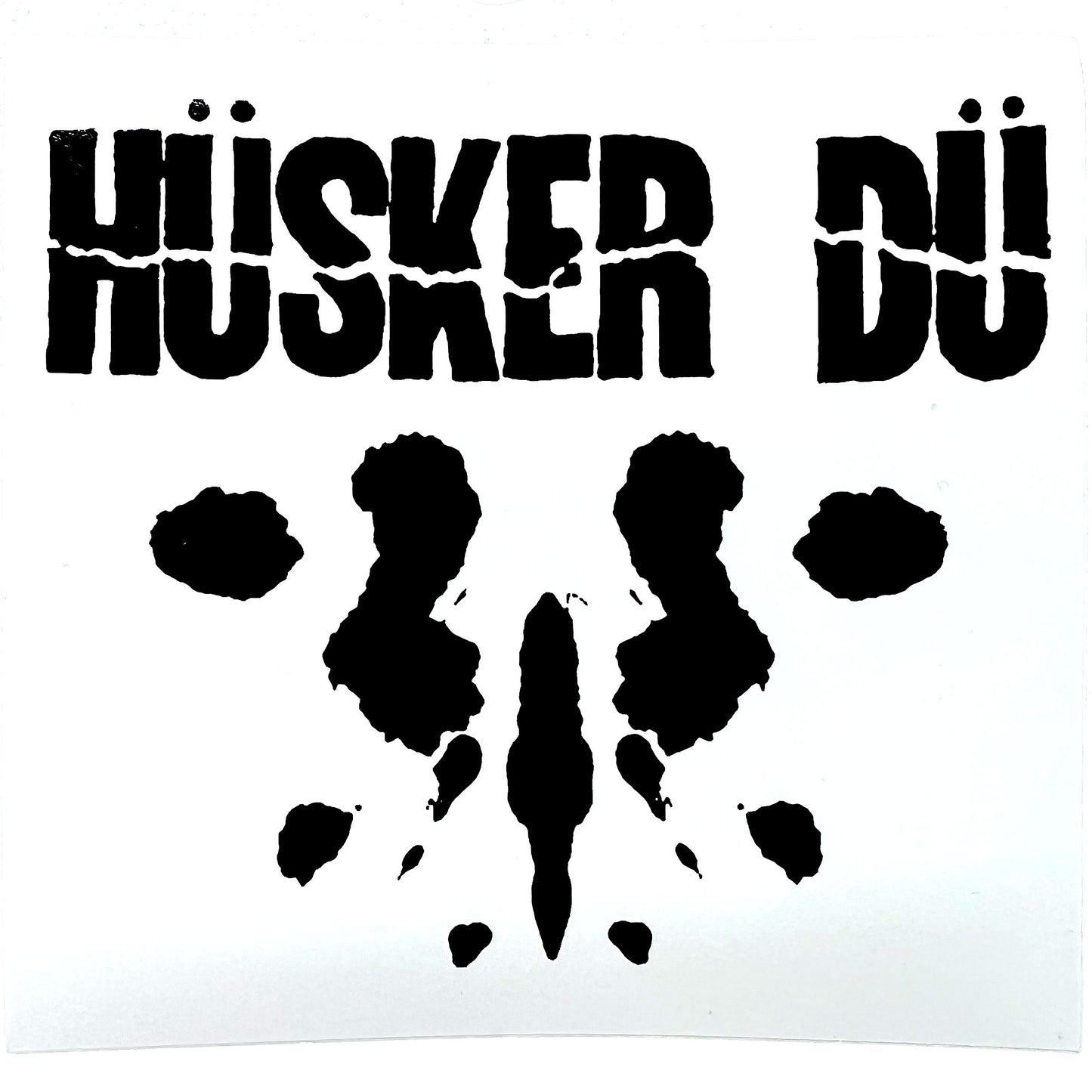 Black On White Inkblot Symbol Under Logo Sticker