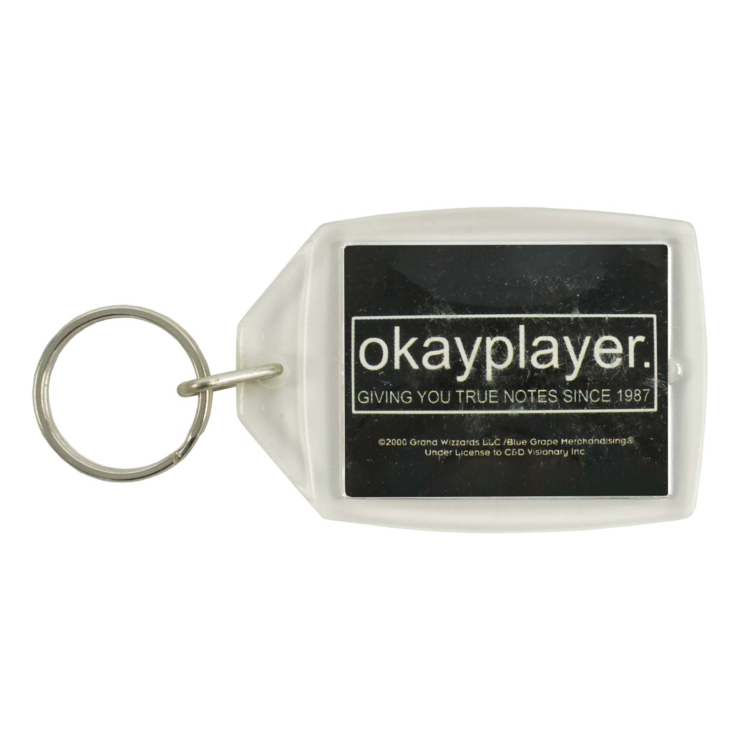 Roots Plastic Key Chain Front